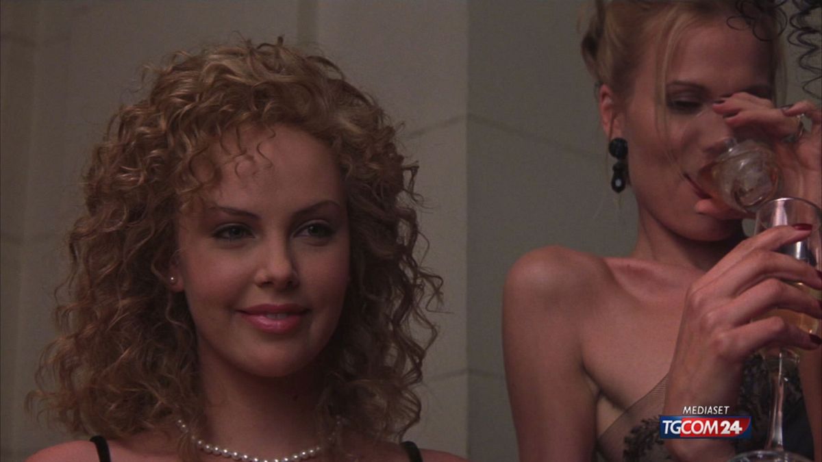 12.00 50 ANNI CHARLIZE THERON SRV
