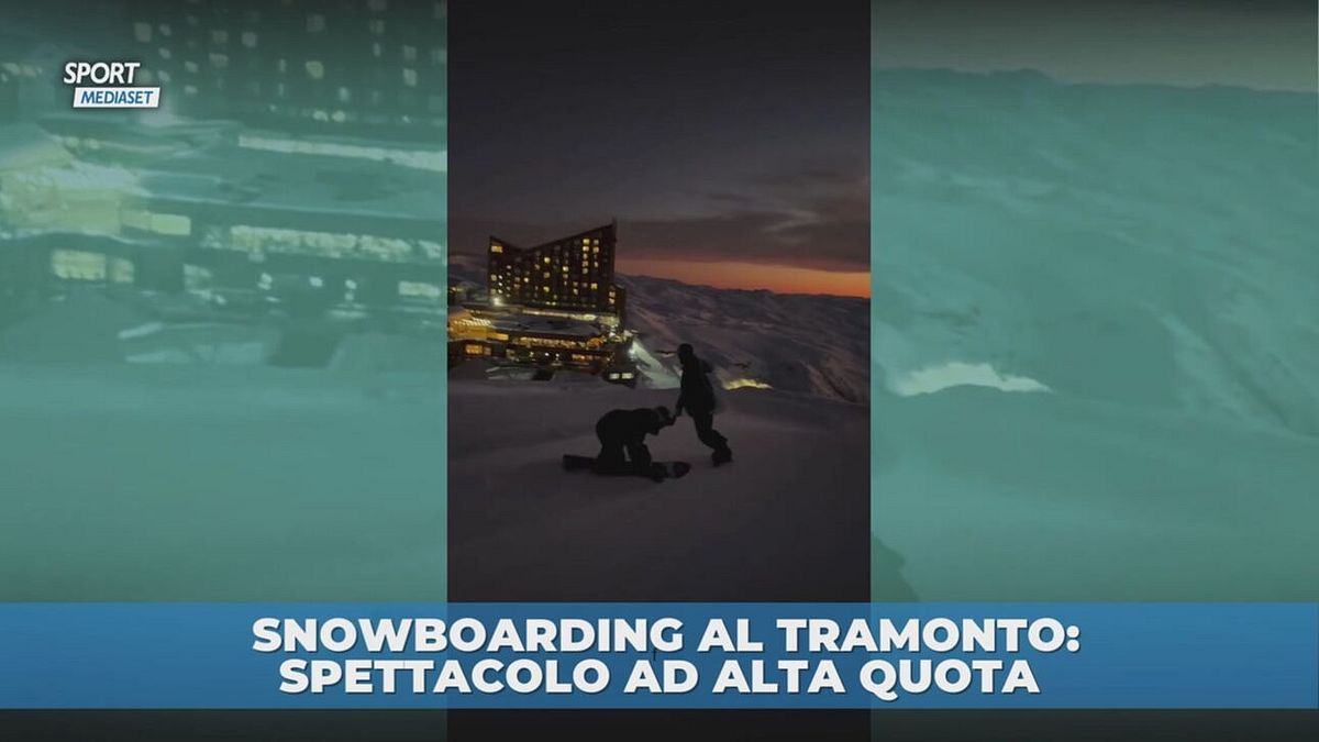 Snowboarding al tramonto