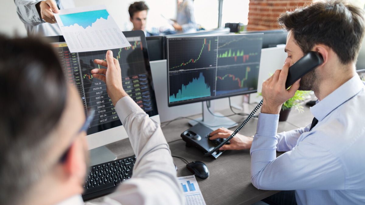 Business team deal on a stock exchange. Stock traders concept.