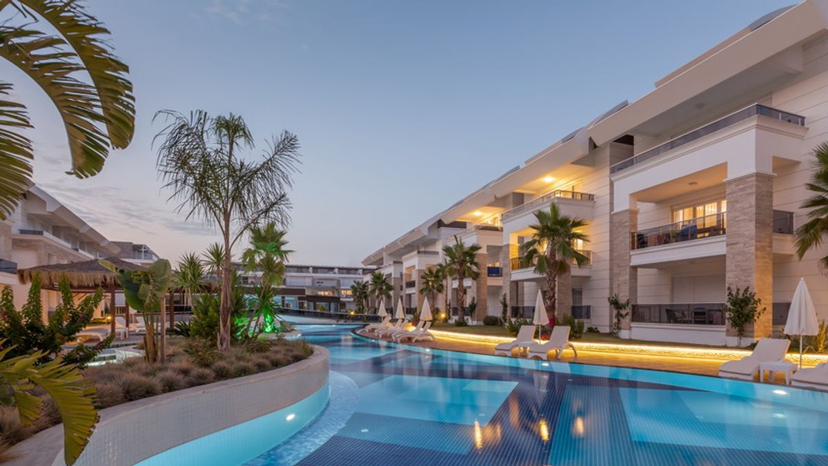 Luxury Construction hotel with Swimming Pool at sunset