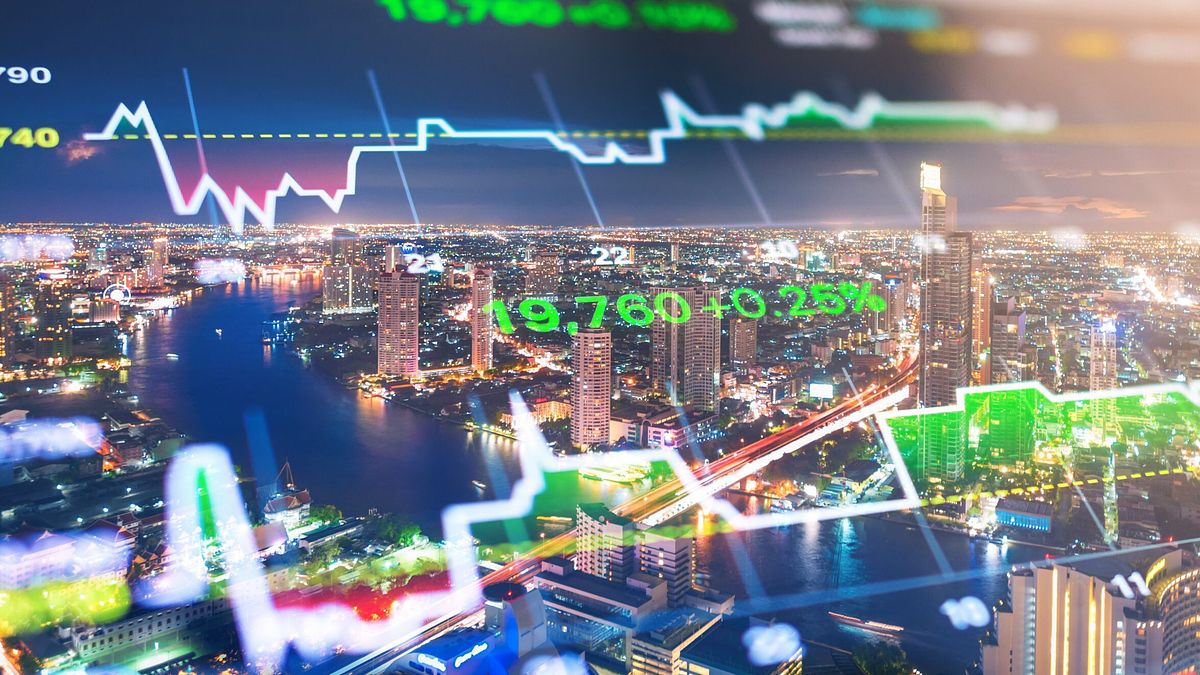 Cityscape thailand with investment theme background and stock market chart