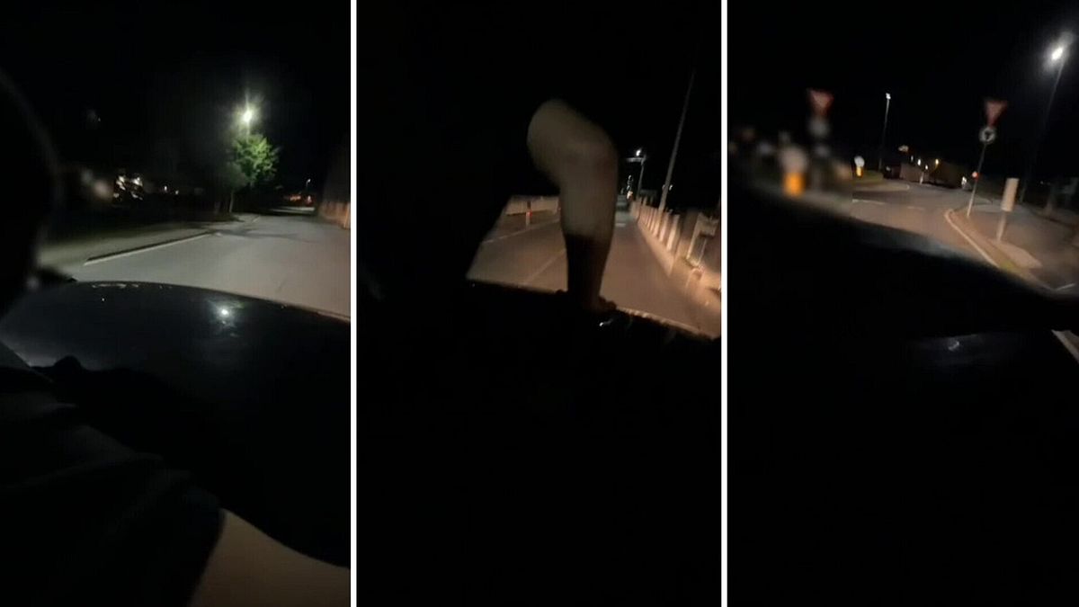 Cadde surfando sul tettuccio dell