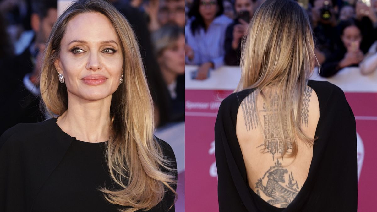 Angelina Jolie in look "total black" e tatuaggi a vista sul red carpet della Festa del Cinema di Roma © IPA