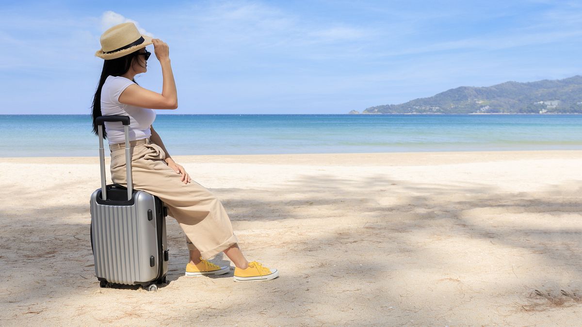 vacanza spiaggia valigia © Istockphoto