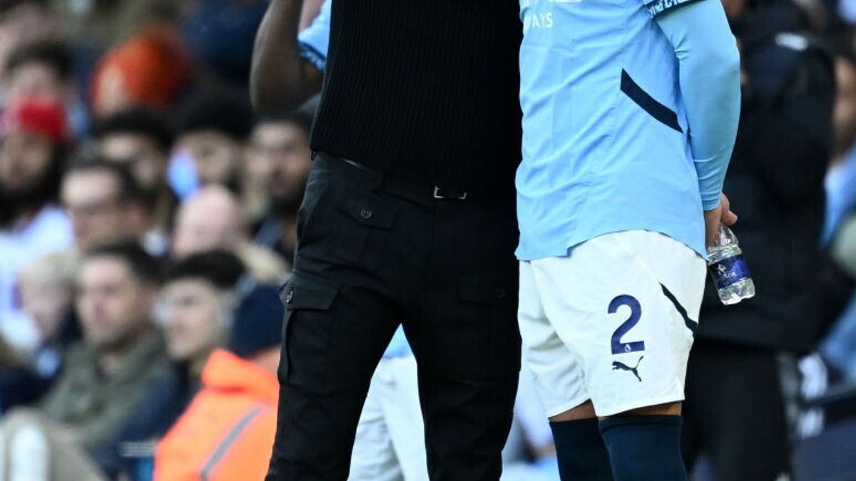 Guardiola e Walker © Getty Images