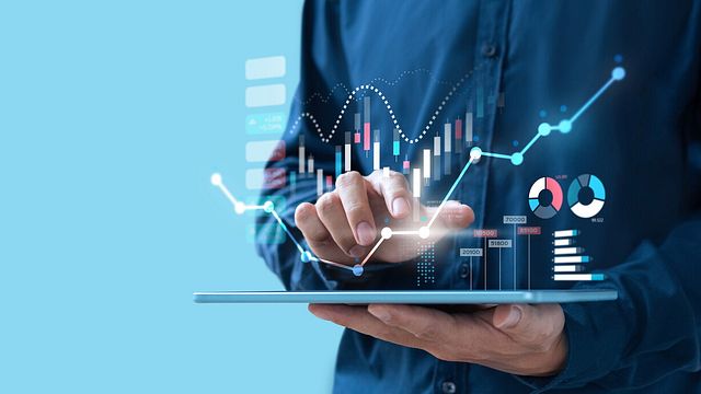  | Businessman trading online stock market on teblet screen, digital investment concept