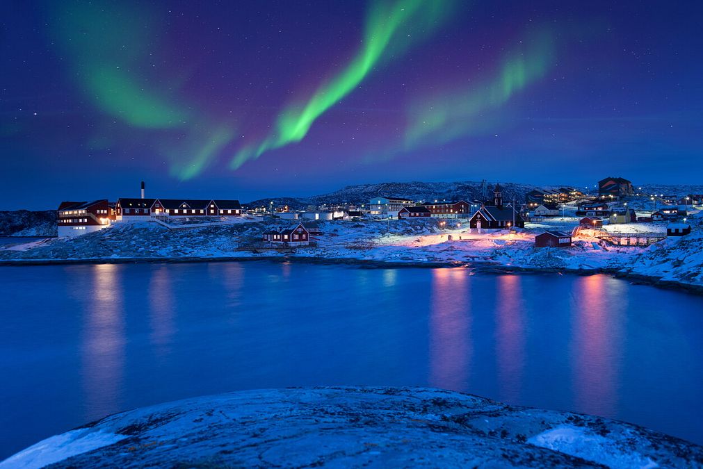 © Istockphoto  | La cittadine di Ilullissat e l'aurora boreale