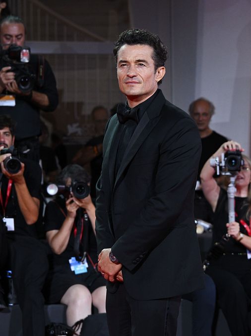© IPA  | Venezia 83, i best look maschili sui red carpet: Orlando Bloom