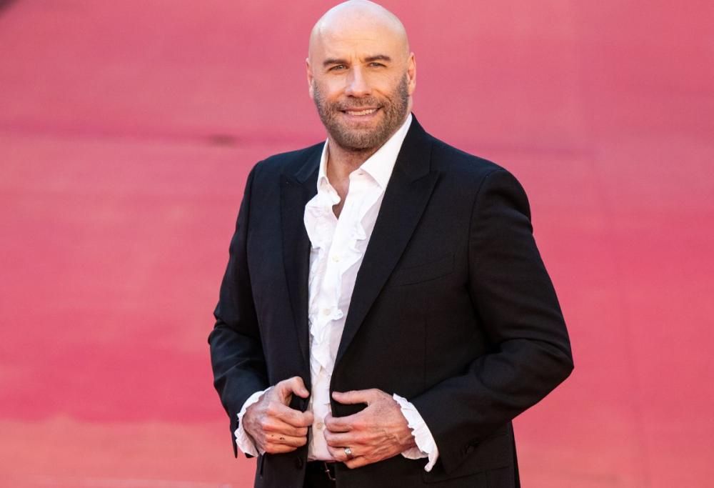 John Travolta a Sanremo: Fiorello gli fa fare “Il ballo del Qua Qua”