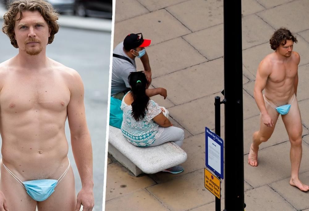 Un uomo nudo gira per le strade utilizzando una mascherina come perizoma