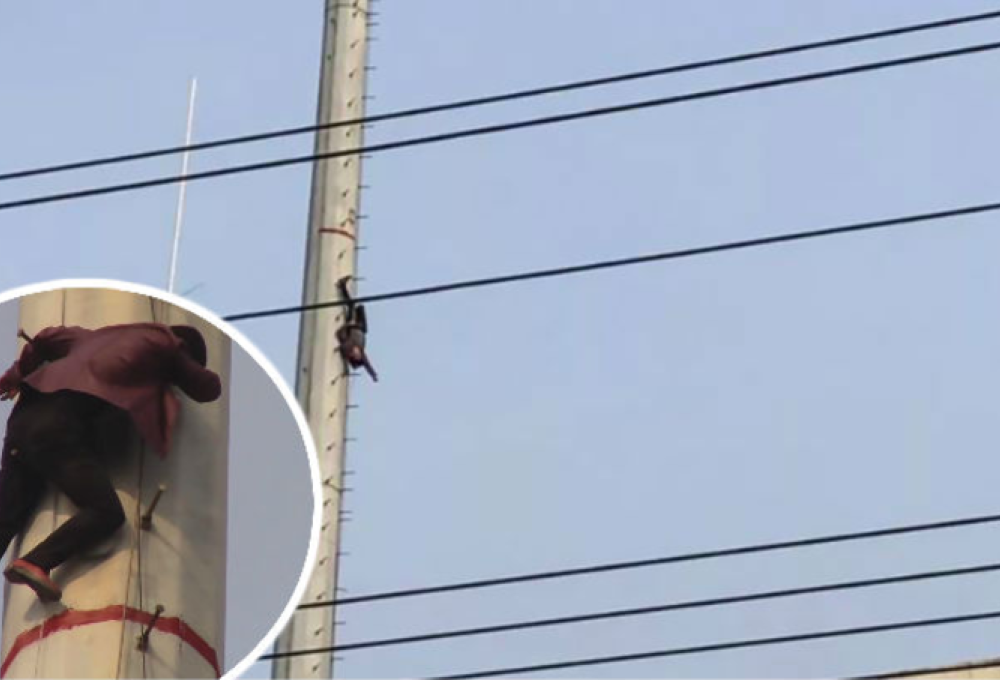 Uomo ubriaco si risveglia a testa in giù appeso a un palo del telefono!