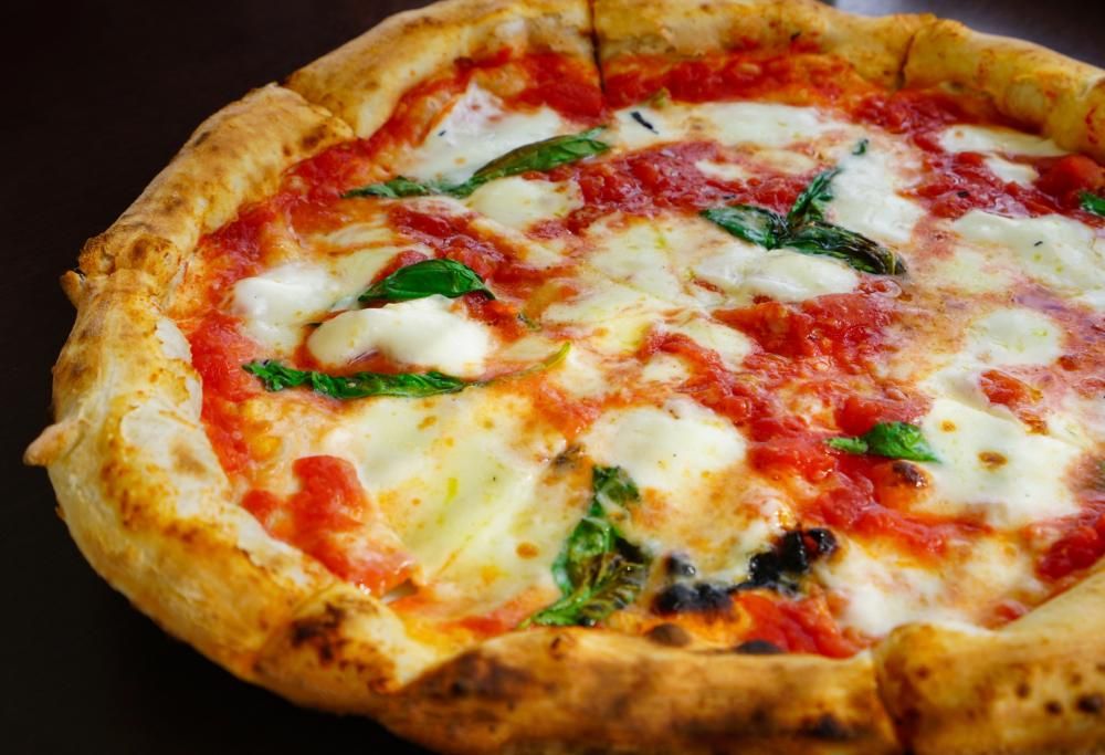 La pizza è l’alimento che rende più felici: la scienza lo conferma