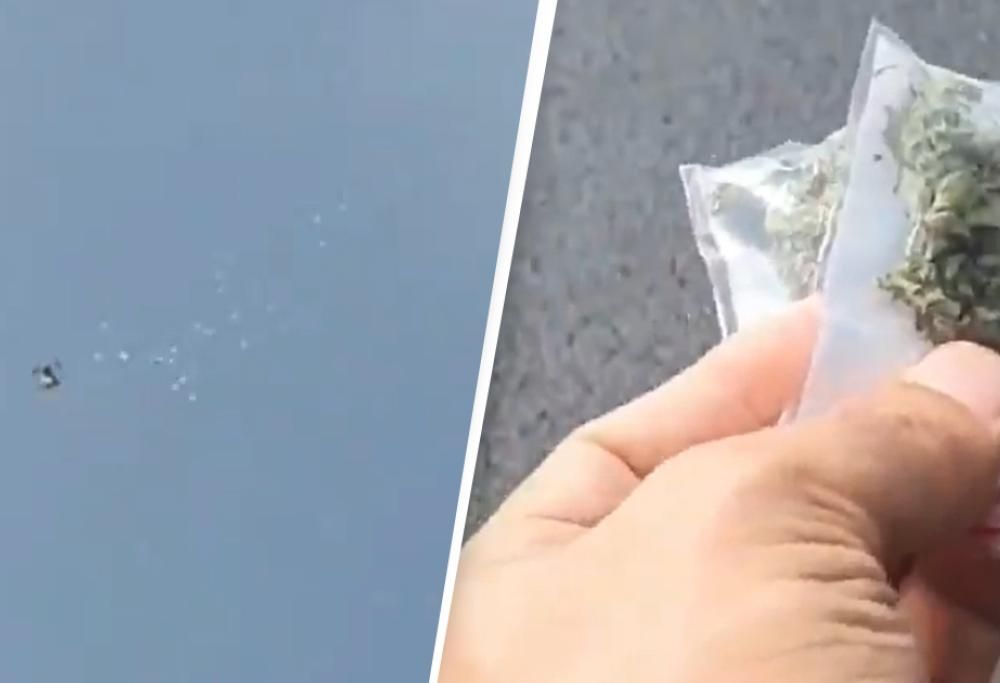 Drone fa cadere sacchetti di erba dal cielo sulla piazza della città