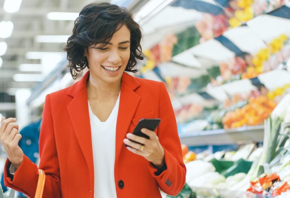 Andare a fare la spesa con lo smartphone fa spendere di più