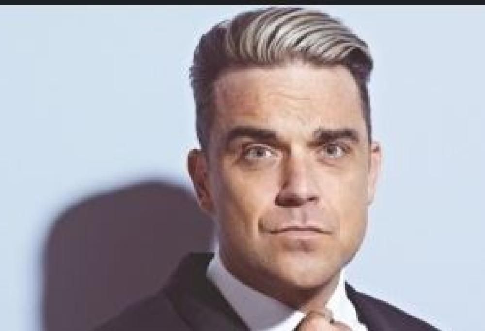 16 dicembre 2001: Robbie Williams e Nicole Kidman primi in classifica