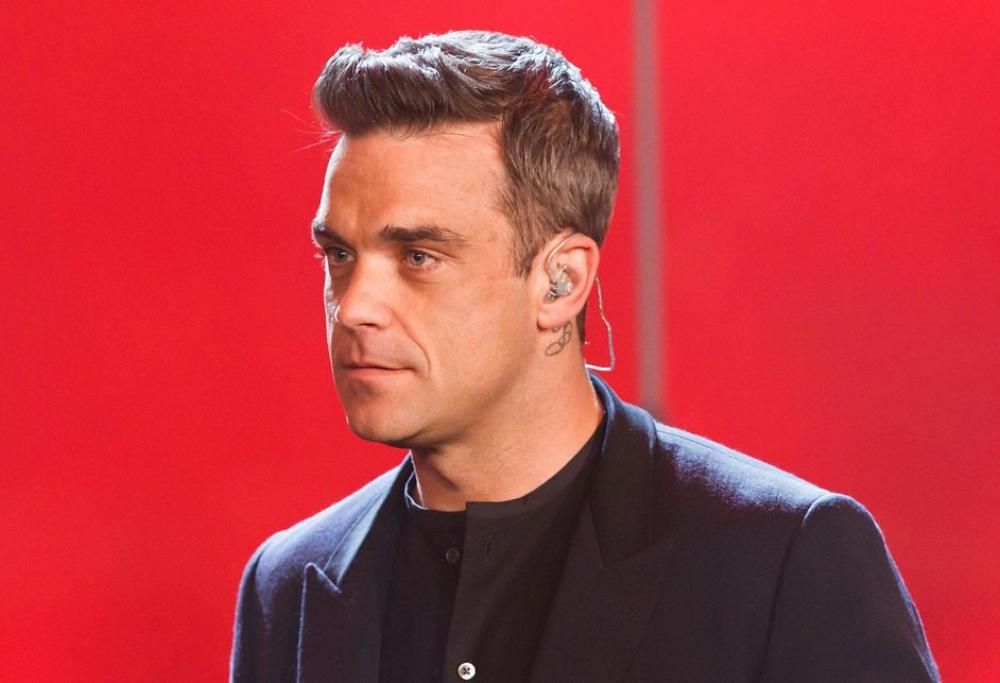 Robbie Williams è una scimmia nel trailer del suo biopic: il bellissimo video
