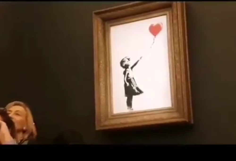 Banksy:  distrutta un’altra Ragazza con palloncino. Ma adesso il valore è di 1 sterlina…