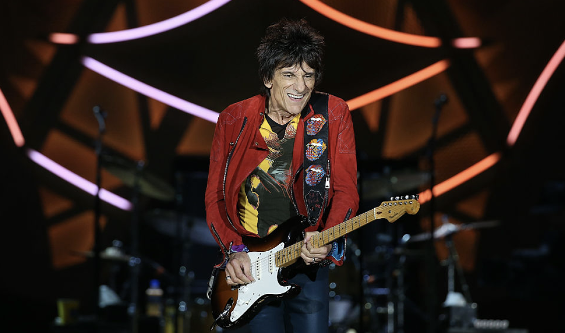 Regolamento: RONNIE WOOD–SOMEBODY UP THERE LIKES ME