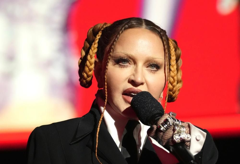 Madonna e Mick Jagger insieme al party dopo gli Oscar. La foto