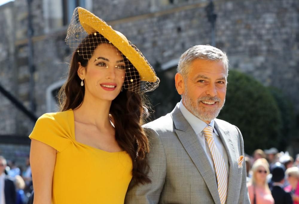 George e Amal Clooney al royal wedding: Harry e Meghan? Non li conosciamo!
