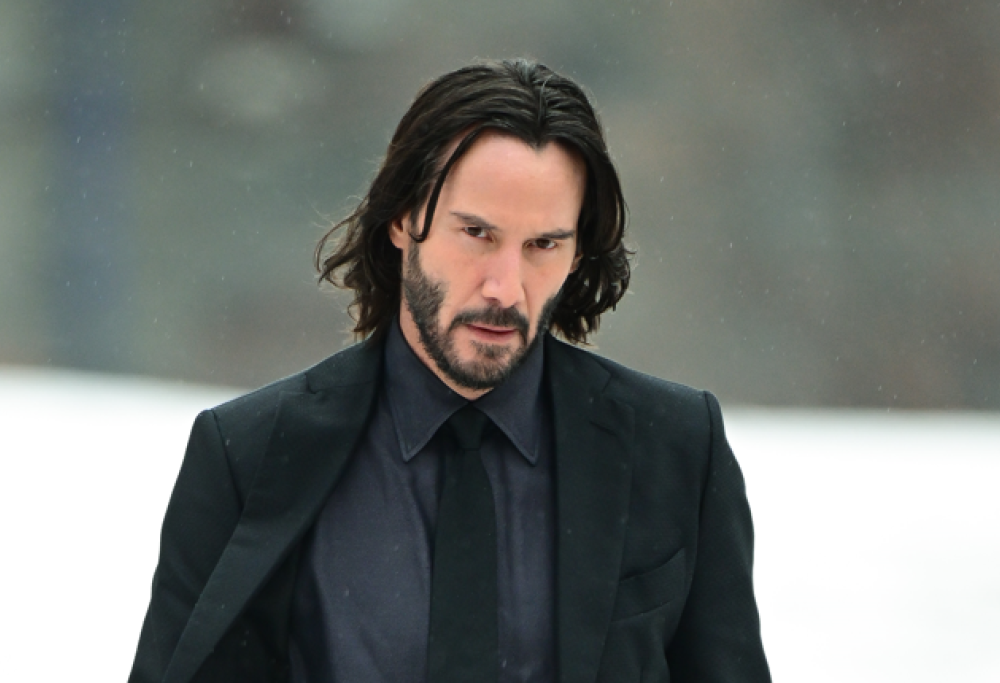 Keanu Reeves sorprende tutti in aeroporto