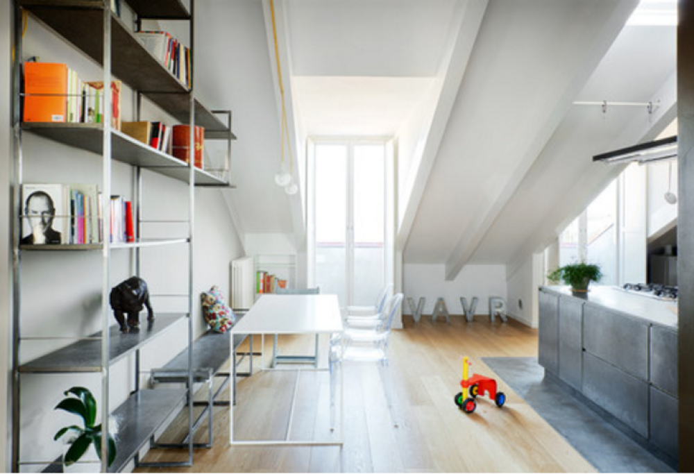 Bellezza sobria ed essenziale: la nuova vita di un sottotetto a Torino