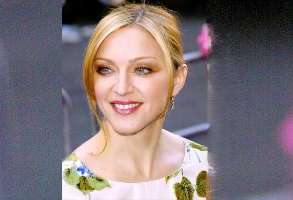 Madonna. La bellissima foto di famiglia. Con un grande assente